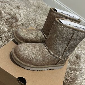 Never worn kids Ugg boots